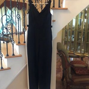 Black jumper w white stripe Straight leg.